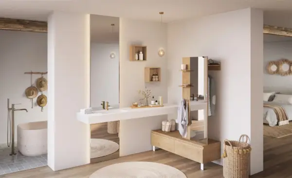 Chambre parentale avec salle de bain épurée, baignoire îlot, double vasque et dressing intégré. Ambiance zen et naturelle.